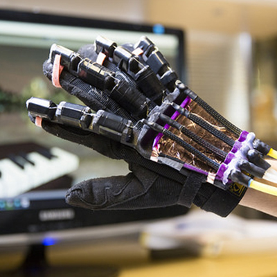 Glove powered by soft robotics simulates tactile feedback in VR environments.