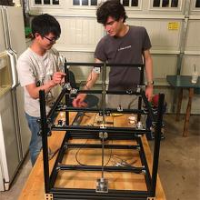 Noah Martin and Alvin Ho build 3D printer to construct Firefly Smart Mirrors.