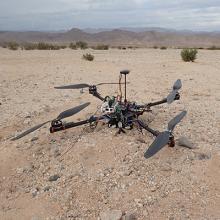Students test a drone for radio collar tracking in the Mojave Desert.