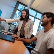 From left: Rose Yu, a faculty member in the UC San Diego Department of Computer Science and Engineering, and Ph.D. student Salva Ruhling Cachay examine data. Photo: David Baillot/UC San Diego Jacobs School of Engineering